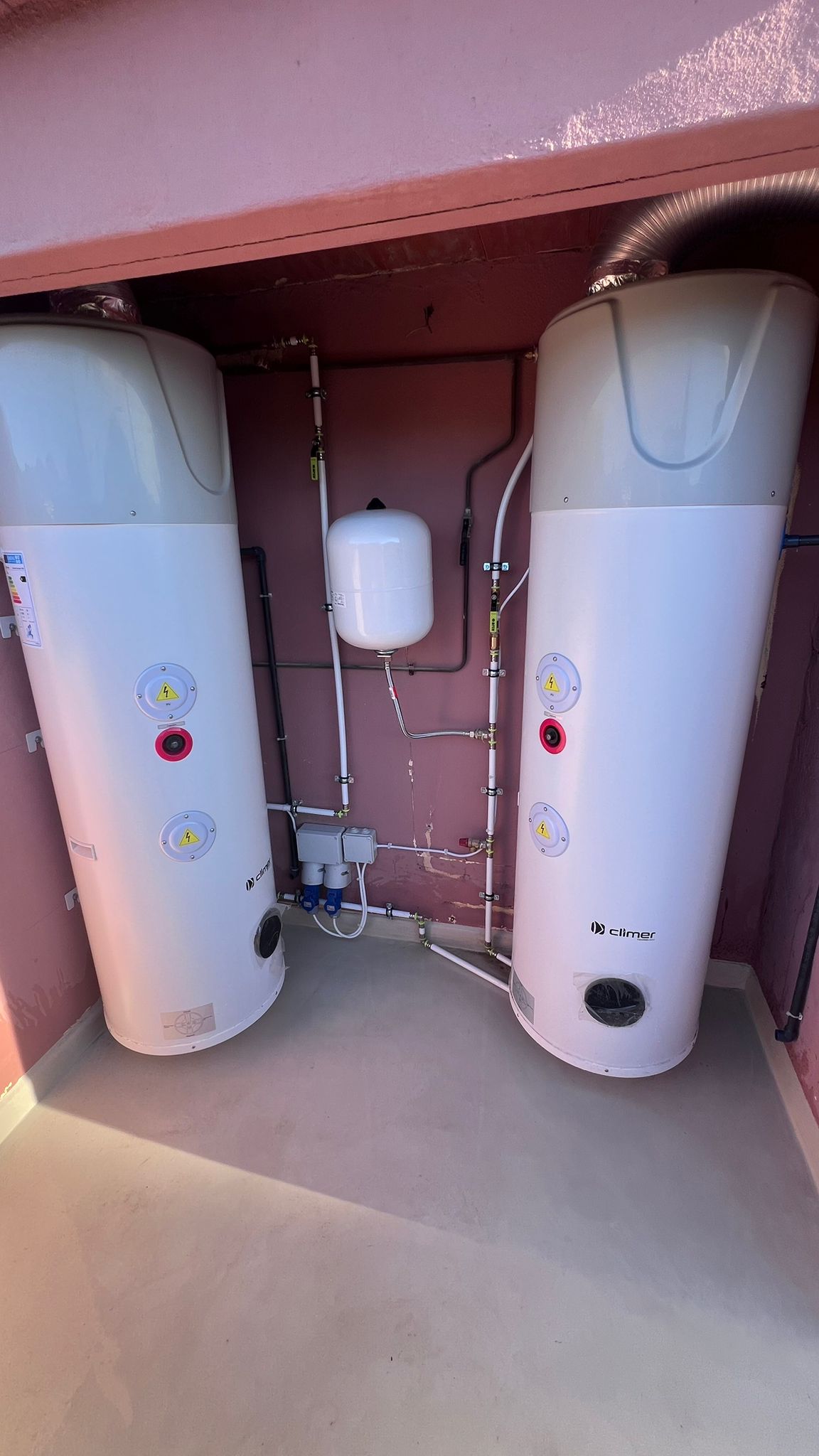 Professional installation of 2 x 160L Climer heat pump water heaters - Calahonda