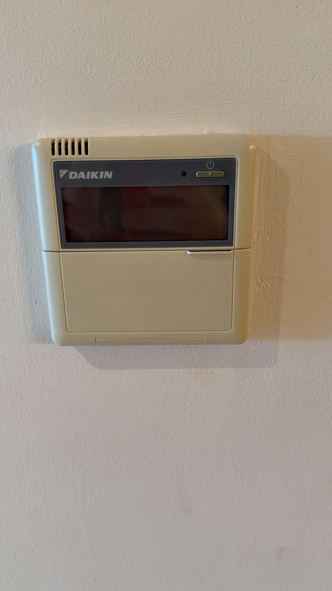 Old Daikin wired controller in Mijas villa before replacement