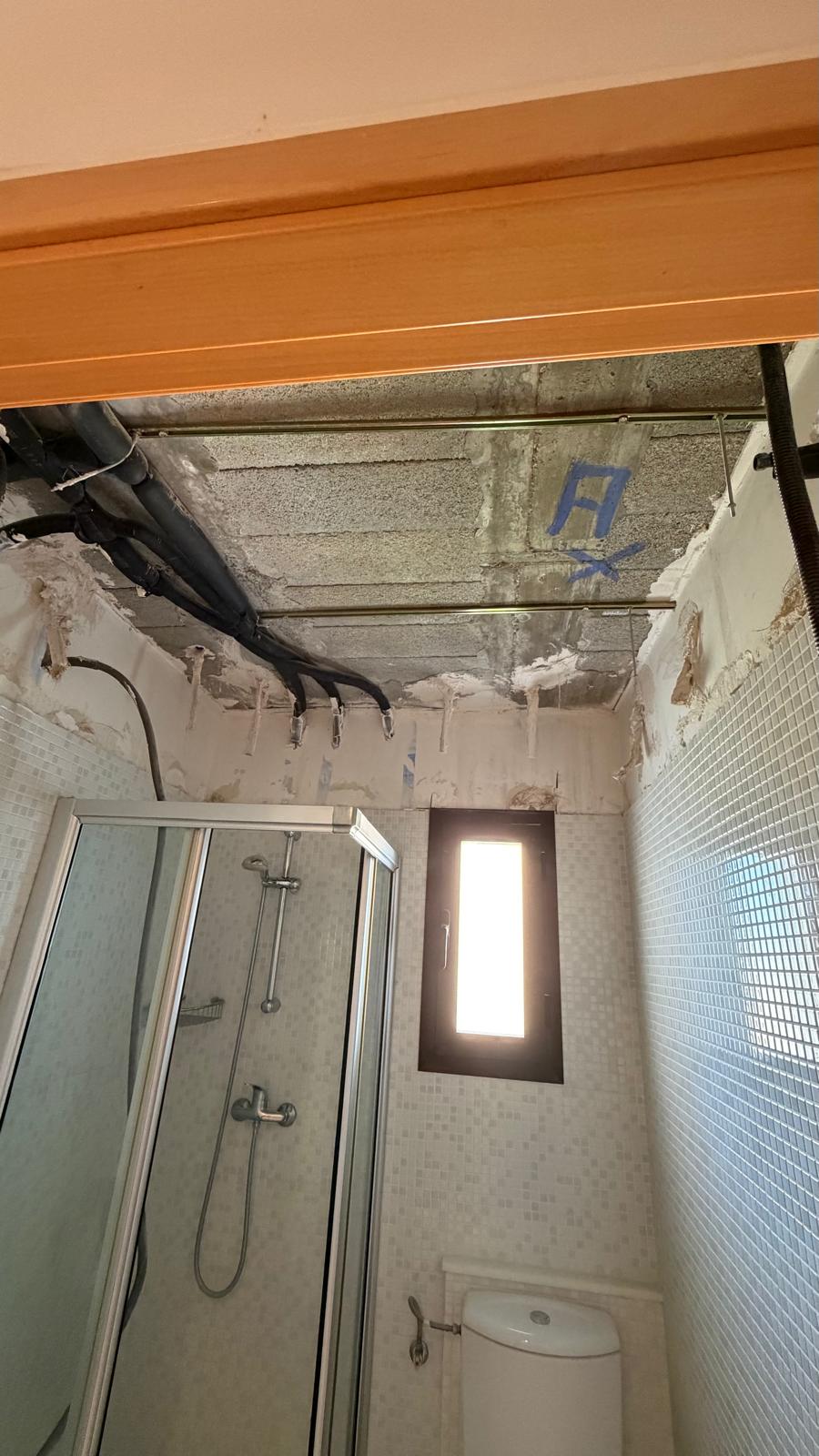 Cleaned ceiling void with legacy lineset stripped, ready for new equipment
