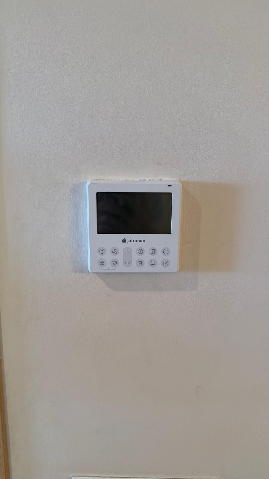 New Johnson wired wall controller installed, replacing the legacy Daikin controller