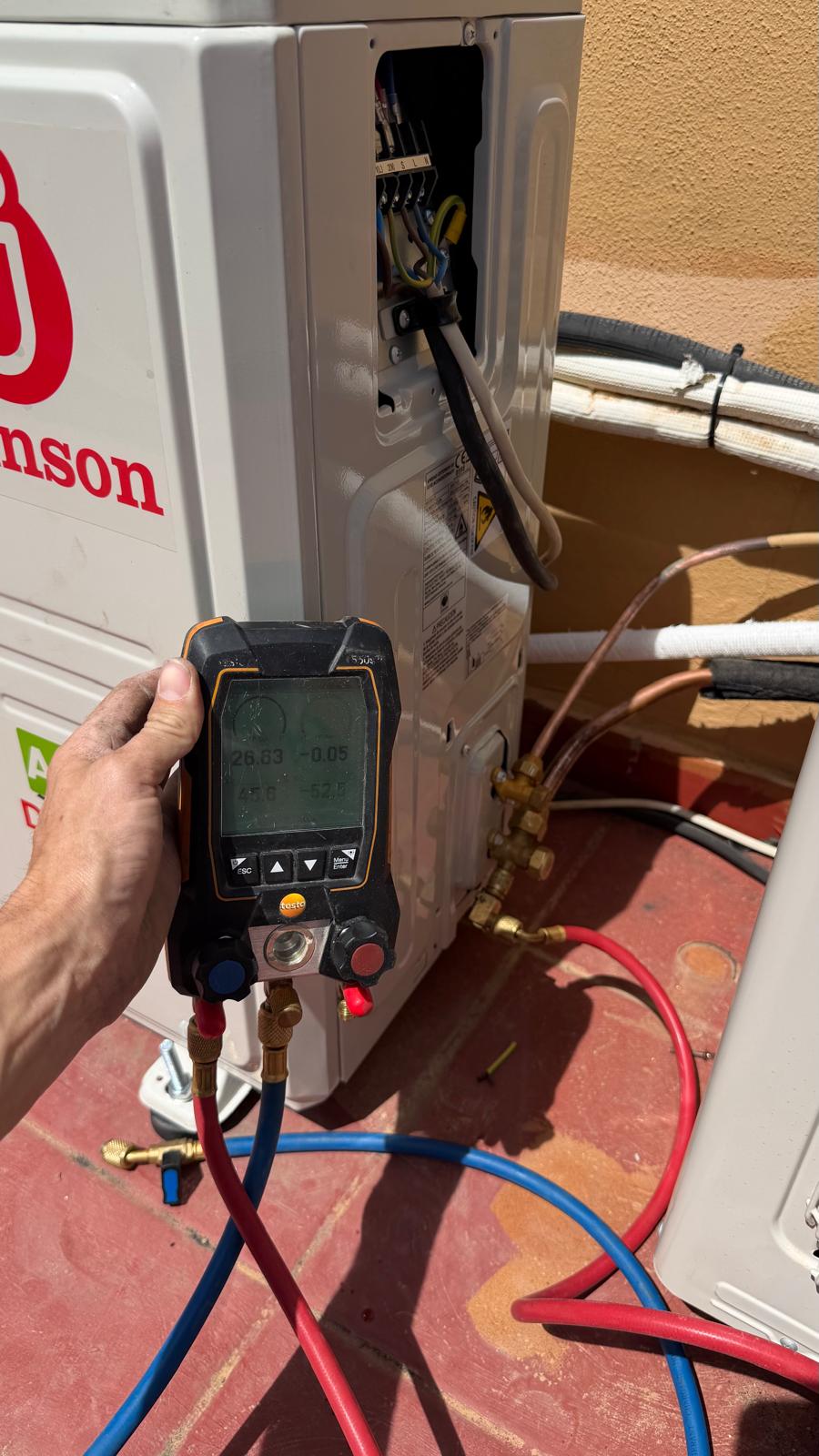 Testo digital manifold gauge performing deep vacuum on the new Johnson refrigeration circuit