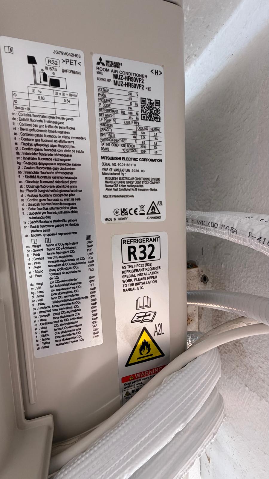 Mitsubishi Electric MUZ-HR50VF2 outdoor unit manufacturer's data plate showing IP44 and R32 refrigerant
